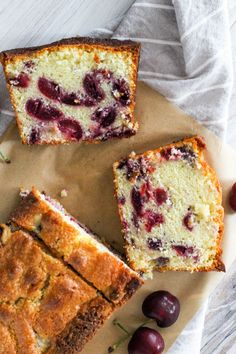 slices of bread with cherries on top and one slice cut off from the side