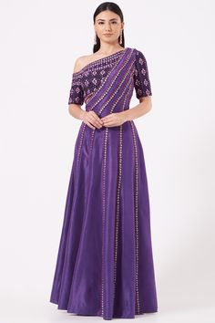 Featuring a purple one-shoulder gown in georgette base with a heavily embellished shoulder drape.    FIT: Fitted at bust.  COMPOSITION: Georgette.  CARE: Dry clean only. Drape Gowns Indian, Gown Indian, Draped Gown, Indian Bride Outfits, Cotton Gowns, Drape Gowns, Indian Gowns Dresses, New Address, Indian Gowns