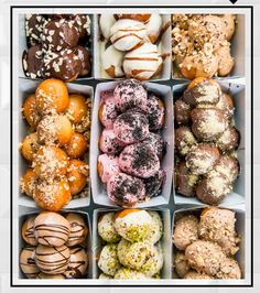 a box filled with lots of different types of doughnuts