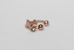 This Sweetest tiniest Little leaves ear huggie. This single earring could work on either ear and does not require a piercing. Easy to adjust.* Choose between 14k gold, rose gold or silver plated brass. * Comes in a pretty gift box.* Sold as single. For updates, new products, one-of-a-kind's, special offers and more-like me on Facebook:https://www.facebook.com/avigailadamjewelleryFollow me on instagram: https://instagram.com/avigailadamjewelry/www.avigailadam.com Delicate Rose Gold Single Cartilage Earring, Dainty Rose Gold Ear Cuff, Gold Bridal Hair Accessories, Lily Bracelet, Fairy Earrings, Floral Cuff, Helix Hoop, Jewelry Nature, Cartilage Hoop