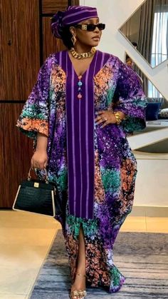 V-Neck Kampala Boubou with Ofi for Embellishments and Zara Cap Ankara Agbada Styles For Ladies, Gown For Kampala, Ladies Agbada Style, Buobuo Gown Style, Styles For Adire Kampala, Adire Kampala Styles For Ladies, Latest Kampala Gown Styles For Ladies, Latest Adire Styles For Ladies, Latest Kampala Style