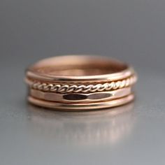 Twisted Rose Gold Stack Rings, Womens Stacking Rings, Rose Gold Ring, Gold Band, Gold Filled Stack Ring, Wedding Ring, Hammered Band This NEW! Gorgeous set of rings is one that you will love! This LittleGreenRoom Set Of 4 Rings is feminine, petite, and can be worn as stack rings, midi rings, or thumb rings. This listing is for 1 set of 4 rings (as seen in photos). This set includes (1) 1.3mm rose gold filled twisted band, (2) 1.3mm rose gold filled smooth bands, and (1) 1.3mm hammered rose gold Hipster Rings, Rose Gold Stackable Rings, Rings Womens, Gold Wedding Bands Women, Stack Rings, Dainty Rings, Ring Rosegold, Stacker Rings, Hammered Band