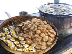 an assortment of food is displayed in baskets