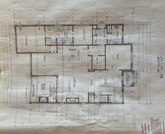 a drawing of a floor plan on top of a piece of paper with some drawings