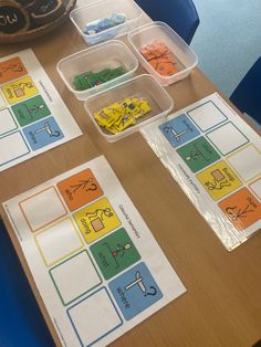 the table is set up with matching cards for children to learn how to read and write