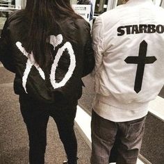 two people wearing jackets that say xo and starboy