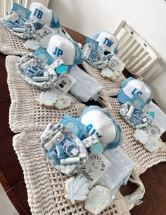 a table topped with lots of blue and white items next to a radiator