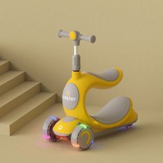 a yellow scooter is sitting on the floor next to some stairs and steps