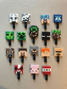 pixelated video game characters are arranged on a wall in order to look like they were made out of legos