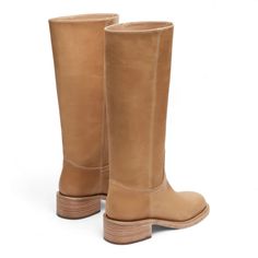 Effortlessly elevate your style with this Steve Madden RIGGS boot. With its square toe and sleek design, this just-under-the-knee boot is a must-have for any fashion-conscious individual. This timeless boot provides both comfort and sophistication, making it the perfect addition to any outfit. 1.75 inch heel height 14.5 inch shaft circumference 13.25 inch shaft height Leather upper material Synthetic lining Synthetic sock Synthetic sole Under The Knee Boots, Heel Tall Boots, Timeless Boots, Glass Slippers, Heel Boot, Knee Boot, Block Heel Boots, Leather Block Heels, Window Shopping