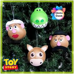 three toy story ornaments hanging from a christmas tree