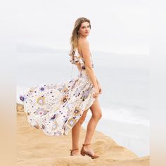 Beautiful Floral Dress With Front Slits From Free People. Worn Very Briefly For A Photo Shoot, Tags Attached. Perfect Flowy, Summery, Whimsical Dress! White Mini Dress For Beach Season And Garden Party, White Mini Dress For Garden Party And Beach Season, Floral Print Split Midi Dress For Summer, Bohemian Split Beach Season Dresses, Bohemian Split Dresses For Beach Season, Vacation Sundress With Split, Floral Print Split Beach Dresses, Beach Dress With Floral Print And Split, Fitted Breezy Dresses For Beach Season