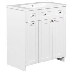 a white bathroom vanity with two drawers and a sink in front of the cabinet door