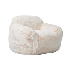 a white chair that is made out of sheepskin