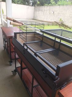 several metal beds are lined up in a row