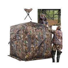 a man standing next to a hunting blind