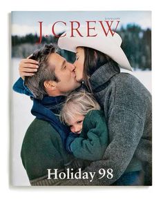 a man and woman kissing each other on the cover of j crew's holiday magazine