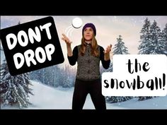 a woman is standing in the snow with her hands out to spell don't drop the snowball