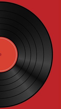 an old record player with its turntable turned red and black, on a red background