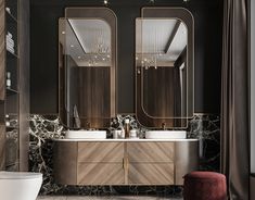 an elegant bathroom with two sinks and mirrors