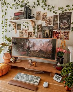 a desktop computer sitting on top of a wooden desk