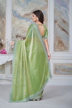 Dolly Organza Stone Cut Work Saree Premium quality fabric Enhanced with stone embroidery work. Comes with unstitch blouse fabric High quality fabric and stitching. Introducing the Dolly Saree, crafted from delicate Organza fabric and adorned with intricate stone cut work. The perfect blend of elegance and artistry, this saree is sure to make a statement. Semi-stitched Chinon Traditional Wear With Resham Embroidery, Pista Green Dola Silk Sets With Zari Work, Pista Green Dola Silk Sharara With Zari Work, Unstitched Dola Silk Sharara With Zari Work, Pista Green Sets With Zari Work, Dola Silk Saree Set With Zari Work, Pista Green Georgette Sets With Zari Work, Unstitched Pista Green Chanderi Lehenga, Pista Green Blouse Piece With Resham Embroidery