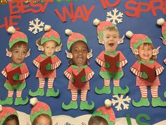 a bulletin board with elfs and snowflakes on it for the holiday season