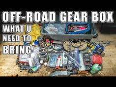 a box filled with assorted items and the words off road gear box what i need to bring