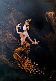 a painting of a woman floating in the water with gold flakes all over her body