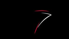 the letter t in red and white on a black background