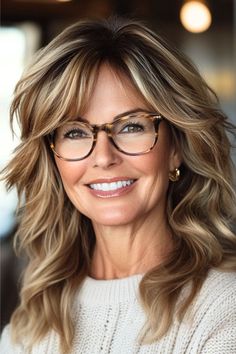 Layered Choppy Waves Hairstyle on a smiling woman in her 50s with brow hair and blonde highlights and glasses. Mena Suvari Hair, Long Layers Over 50, 50 Year Old Hairstyles Long, Bangs For Square Face Shape, Thick Long Hair With Layers, Shoulder Length Hair Over 50, Hair Styles For Women Over 40, Feathered Bangs Long Hair, Long Thick Layered Hair