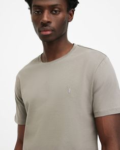 Basics at their best. The Brace Tonic Crew T-Shirt is made from carbon-brushed cotton for a soft handfeel and detailed by our Ramskull embroidery on the chest.  Pullover Crew neck Short sleeve Carbon brushed cotton Ramskull embroidery Model is 6'2"/188cm and wearing size Medium Allsaints Casual Crew Neck T-shirt, Casual Allsaints Crew Neck T-shirt, Allsaints Crew Neck Top For Everyday, Allsaints Casual Crew Neck Top, Allsaints Everyday Crew Neck Top, Allsaints Cotton Tops For Everyday, Everyday Allsaints Cotton Tops, Leather Trainers, Shoes Outlet