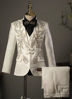 Kids Boys White Brocade Jacquard Beading 4 Piece Formal Blazer Suits Set for Party   Condition: Brand New  Color:White  Size:5(110,110cm-120cm);6(120:118m-125cm);7(130:125cm-135cm);8(140:135-145cm);10(150:145cm-155cm);12(160:155cm-160cm);  Material:Brocade  Design:Brocade Jacquard,Sequin,Beading  The Finest High Quality,Anti-wrinkle, No-iron, Non Fade, Texture, Breathable, Soft and Comfortable.  Includes:1x Jacket + 1x Vest + 1x pants+ 1x bow tie  Boys suits size from 5 to 12 Party Sets With Pearl Embroidery In Gold, Elegant Gold Party Season Sets, Gold Party Sets With Pearl Embroidery, Fitted Suits With Gold Embroidery For Party, Fitted Party Suit With Gold Embroidery, Gold Brocade Party Sets, Elegant Sets With Gold Embroidery For Party, White Sequined Party Set, Fitted Brocade Sets With Gold Embroidery