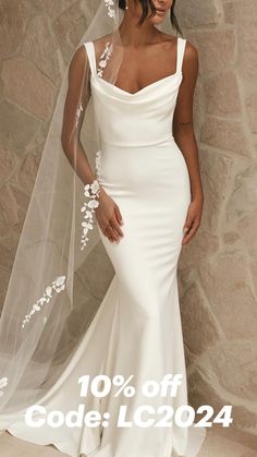 a woman in a white wedding dress with a veil on her head and the words 10 % off code l0204