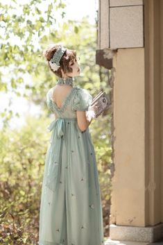 Experience the charm of the Romantic Mint Green Regency Era Embroidered Dress With Ruffle - Empire Waist Dress Plus Size. This exquisite dress is inspired by the elegance of Queen Charlotte gowns, capturing the essence of Bridgerton-inspired fashion.Crafted with meticulous attention to detail, this dress features delicate embroidery that adds a touch of romance and sophistication. The empire waist design accentuates your curves and creates a flattering silhouette. The flowing skirt adds grace an Outfit Ideas Autumn, Regency Wedding, Fashion Through The Decades, Empire Waist Gown, Empire Silhouette, Regency Era Fashion, Rococo Fashion, Lace Dress Design, Regency Dress