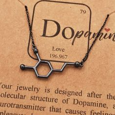 "Show your love through science with my black Dopamine molecule necklace! Dopamine is the neurotransmitter and hormone that causes feelings of pleasure, addiction, desire and love. Makes a great anniversary present, Valentine's Day gift, Mother's Day present or for any occasion inspired by love! 🔬For other science themed jewelry, please check out my main shop page 👉\"www.etsy.com/shop/molecularmotifs ✦ CUSTOM CHAIN OPTIONS ✦ Choose your chain length and chain material in the drop-down menu. St Black Hypoallergenic Necklace As A Gift, Black Hypoallergenic Necklace For Gift, Dopamine Molecule, Psychology Gifts, Molecule Necklace, Christmas Science, Custom Chain, Science Themes, Art Carte