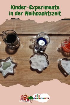 a wooden table topped with different kinds of cookies and cups on top of each other