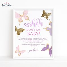 a pink and gold butterfly baby shower sign with the words, ssssh don't say baby