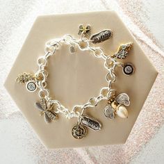 Pearl Honey Bee Charms | Waxing Poetic Waxing Poetic, Bee Charms, Fresh Water Pearl, Brass Accents, Pearl Charms, Tiffany Heart, Chain Ring, Honey Bee, Words Of Encouragement