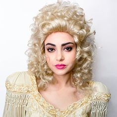 This is another favorite of ours for the big curly blonde look of our favorite icon, Dolly Parton! We'll include a wig cap with your purchase! All sales final. Diy Wig, Sparkle Gift, Champagne Blonde, Wig Party, Sparkle Jewelry, Dolly Parton, Wig Cap, Colorful Makeup, Party Event