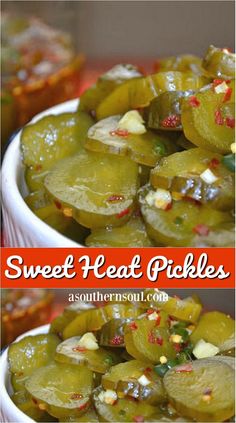 two bowls filled with pickles on top of a table