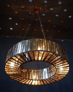 a chandelier hanging from the ceiling in a room