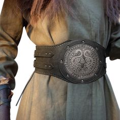 PRICES MAY VARY. 🌳 COOL DESIGN- Unique viking style wide belt, for the true viking warriors. Vintage buckles with embossed traditional patterns, bring you back to the viking age. Are you ready to unleash your rage?! 🌳 HIGH GRADE FAUX LEATHER-Handcrafted with the atmosphere of the times, Premium faux leather but has the touch and smell of genuine leather, cheaper and more protective than genuine leather. We love animals and all the living kinds! 🌳 ADJUSTABLE-One size for all. Suitable for most of the body shapes (waist length 94cm/37inch-130cm/51.18inch),If not, you do need more exercises my warrior. Comfortable and suitable any time any where. 🌳 FOR ANY OCCASIONS- Suitable for the LARP, Fantasy Events, Renaissance Faire, Comic Con, Halloween Cosplay Parties, Even for Daily Use. Drink a Wide Waist Belts For Women, Celtic Fashion Medieval, Renfest Accessories, Traditional Viking Clothing, Celtic Knight, Medieval Mercenary, Waist Armor, Viking Clothes, Norse Clothing