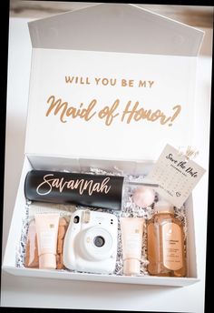 an open box containing personal care items and a card that says, will you be my maid of honor?