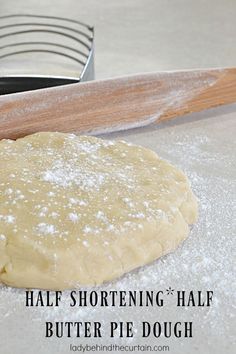 half shortening half butter pie dough next to a spatula on a counter top