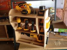 a work bench with tools on it in a garage