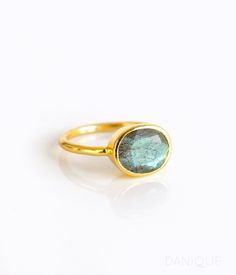 This beautiful stackable bezel set ring features a natural oval faceted Labradorite gemstone in 18K Vermeil Gold. The ring has a 925 stamp. Gemstone size is 8 x 12 mm. Since I use natural gemstones, the Labradorite stones may vary from blue to green to gray and have variations in the flashes of iridescent colors. This ring is available in two finishes: ✦ 18K VERMEIL GOLD ✦ ROSE GOLD ✦ BRIGHT STERLING SILVER Ring will be shipped in Danique Jewelry gift box. This ring is great for stacking and we Blue Gemstone Rings, Gold Vermeil Jewelry, Bezel Set Ring, Trendy Ring, Labradorite Jewelry, Oval Ring, Oval Rings, Labradorite Ring, Blue Gemstones