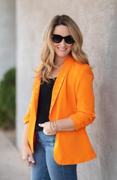 Elevate your professional look with the Orange Studded Blazer. Featuring subtle stud embellishments and a vibrant orange color, this blazer is ideal for any OSU fan wanting to show their pride in a work setting! Details + Fit dry clean only Do Not Bleach Fits true to size Model is wearing size medium Studded Blazer, Orange Blazer, Blazer Jackets For Women, Professional Look, Vibrant Orange, Blazers For Women, Orange Color, Blazer Jacket, Embellishments