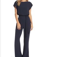 Crepe Fabrication Scoop Neckline Cap Sleeves Tie Waist Detail Side Seam Pockets Fully Lined Straight Hemline Zip Back Closure Approx. 31" Inseam Polyester Dry Clean Gwn-30 Chic Navy Jumpsuit For Work, Crepe Jumpsuit, Eliza J, Cap Sleeve, Scoop Neckline, Cap Sleeves, Pant Jumpsuit, Jumpsuit Romper, Pants For Women