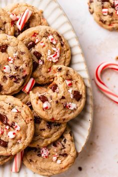 chocolate chip cookies with candy canes on a plate